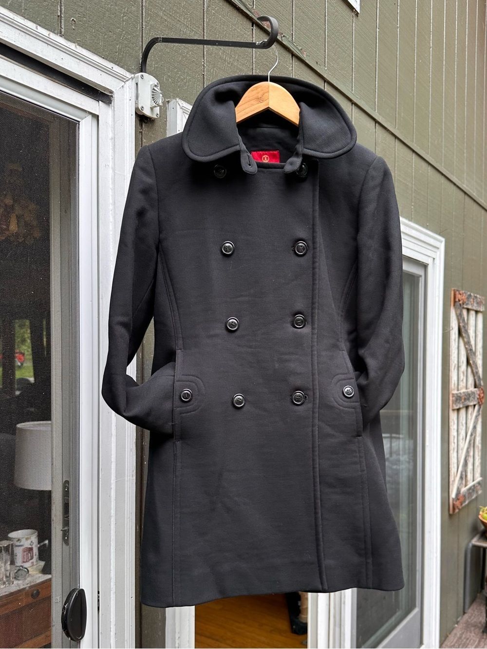 Exquisite stylish Cole Haan Black Hooded Coat with Patterned Lining.